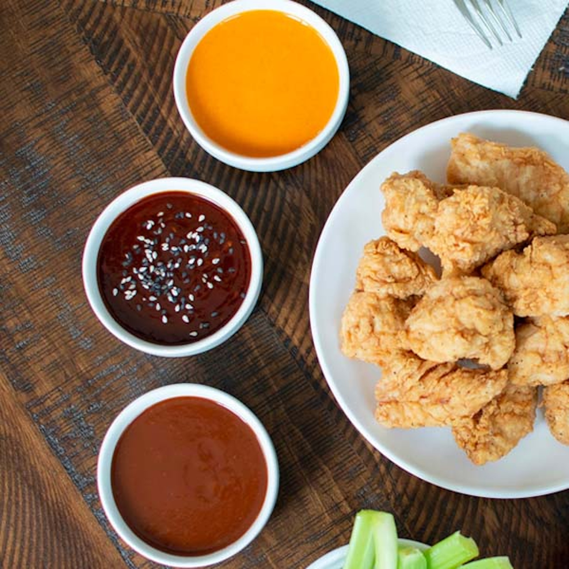 Sauce It Like It’s Hot: 7 Clever Ways to Use Our Wings Sauces When Cooking at Home