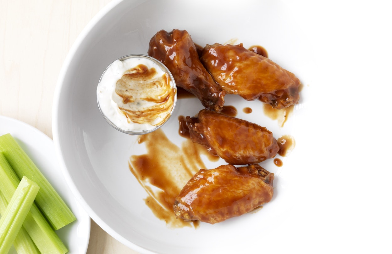 Why Serve Celery With Chicken Wings and 6 Other Common Chicken Wing FAQs